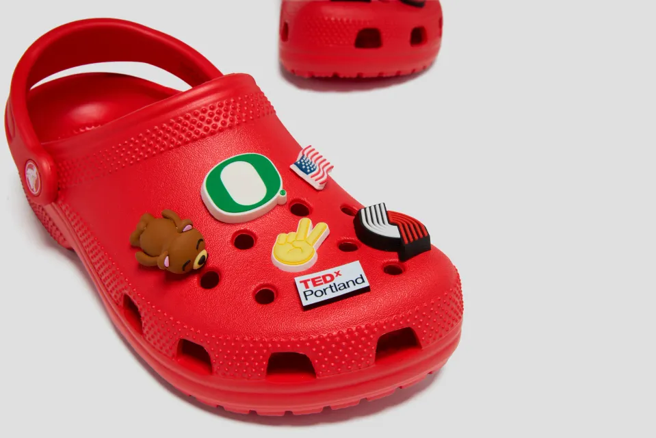 Red Crocs classic clog with TEDxPortland and Portland-themed Jibbitz charms